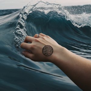 Leonardo_Kino_XL_A_tattoo_of_a_minimalist_wave_design_placed_o_2