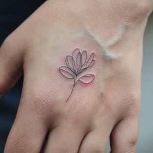 name tattoo on hand for girl