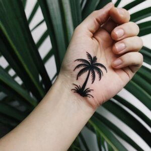 palm tree and beach tattoo