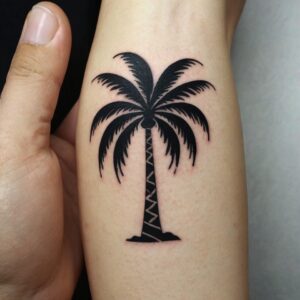 palm tree tattoo on forearm