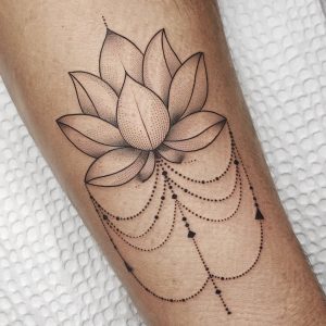 simple lotus flower tattoo