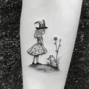 alice in wonderland flowers tattoo