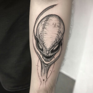 alien head tattoo