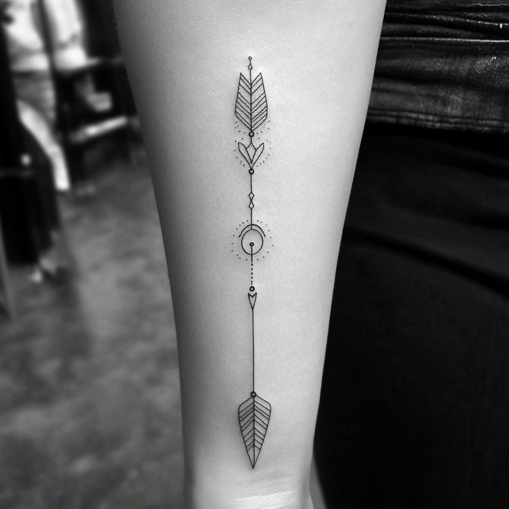 traditional arrow through compass tattoo