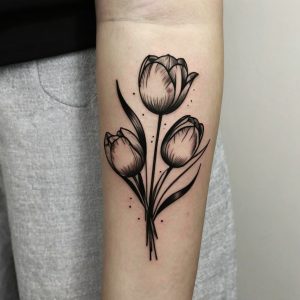 black and white lotus flower tattoo