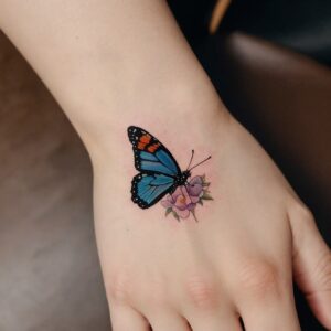 butterfly hand tattoo for women