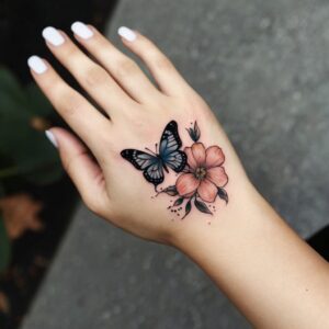 butterfly tattoo on hand for girl simple