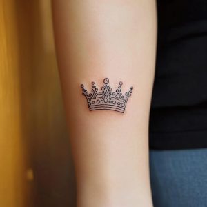 crown and lion tattoo