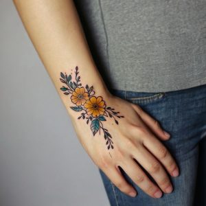 flower hand tattoo