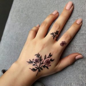 Flower hand tattoo designs