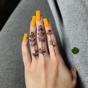 flower hand tattoo female