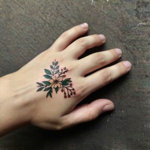 flower hand tattoos women