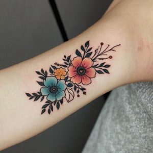 flower inner arm tattoo