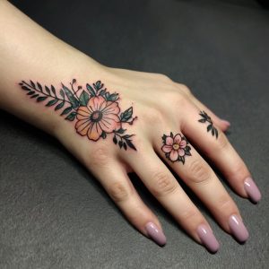 flower tattoo on hand