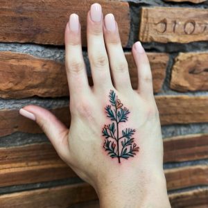 flower tattoos for women’s hands