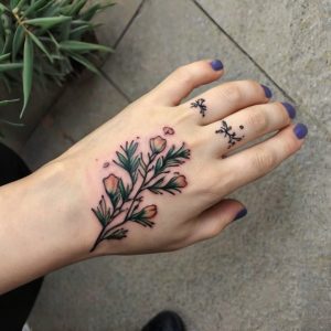 flower tattoos on the hand