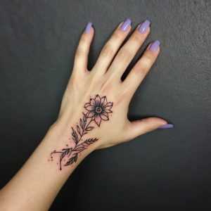 hand flower tattoos