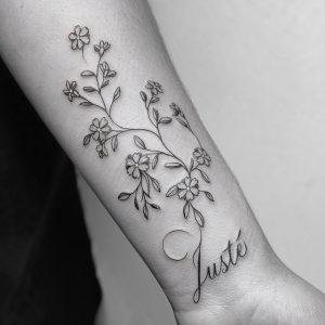 rose vine tattoo