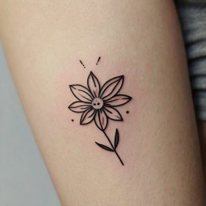 simple flower tribal tattoo design on shin