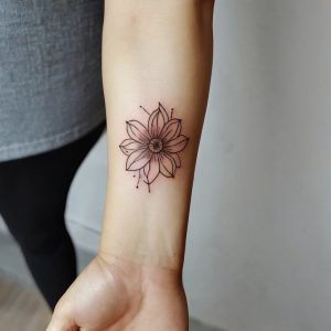 simple tattoo on hand for girl