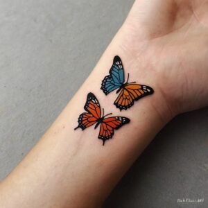 small butterfly tattoo wrist