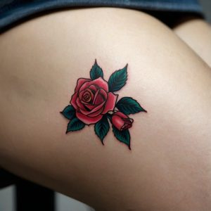 small faded rose tattoo