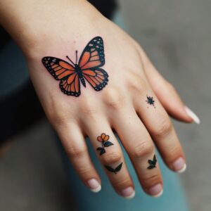 small hand butterfly tattoo