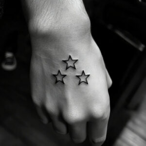 sun and 3 stars tattoo