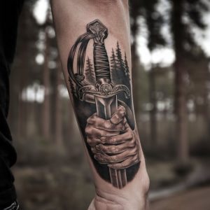 forearm sword tattoos