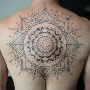 male lower back tattoo